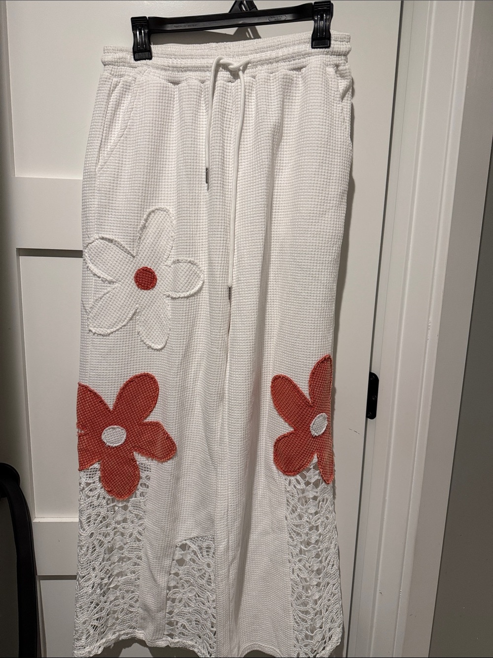White Pants with Coral Flower Appliqués
